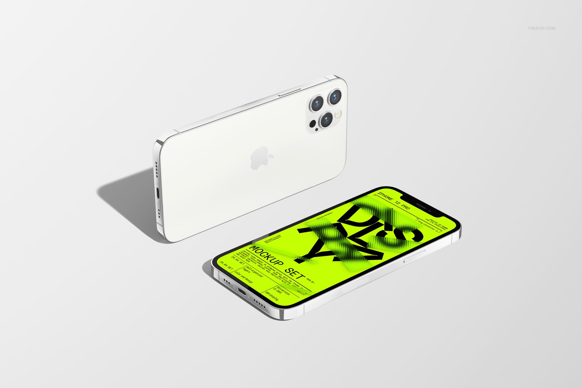 White iPhone 12 Pro mockup set with one phone showing a neon green display and another positioned face down.
