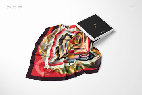 Colorful twill silk scarf mockup featuring bold geometric shapes and wavy lines, shown beside a closed black box.