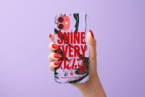 Front view of an iPhone 12 glossy snap case mockup with red typography and swirling black and white background.