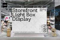 Front view of a large rectangular light box display mockup in a modern storefront with glass walls and retail interior.