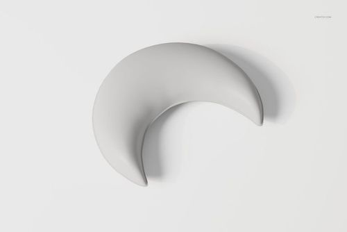 Crescent moon-shaped pillow in light gray fabric, shown from a top view against a plain white background.