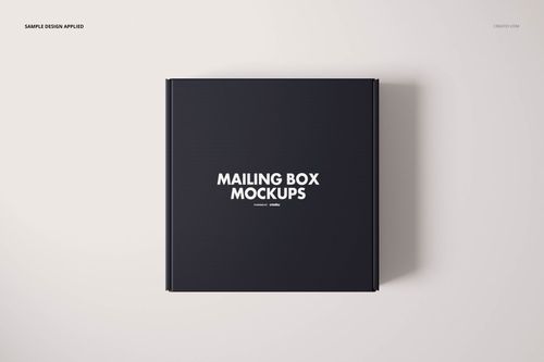 Square mailing box mockup with a matte black finish, viewed from above on a light neutral background.