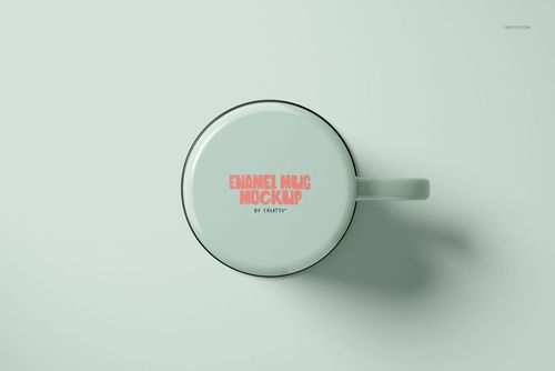 White enamel mug mockup shown from above, displaying pink lettering on the side, set on a pale surface.