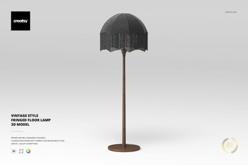 Vintage style floor lamp with a dark fringed lampshade and slender wooden stand, shown from the front on a light background.