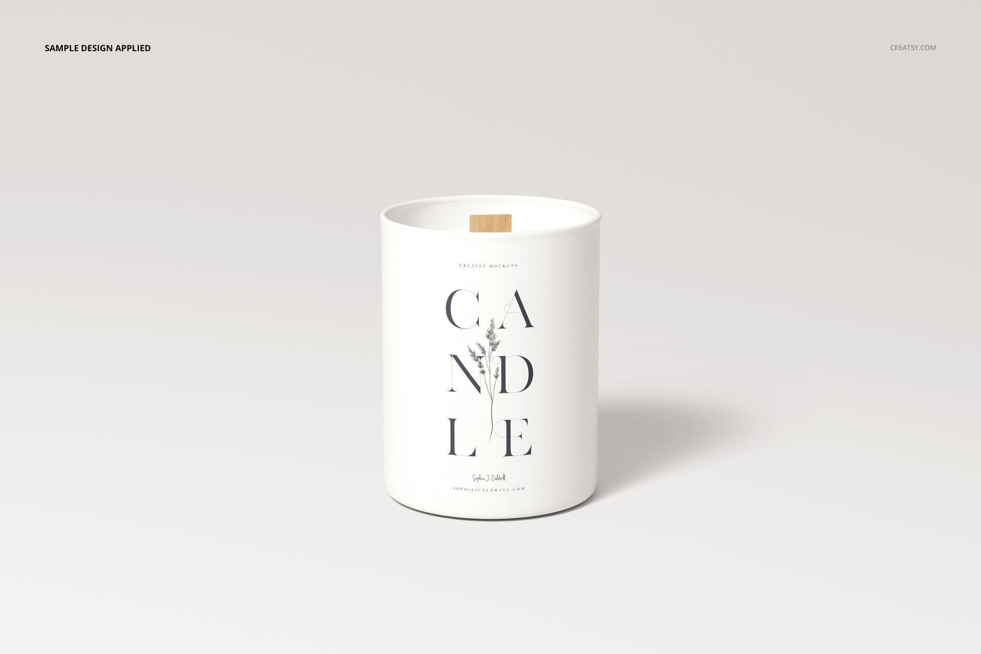 Mockup of a white candle featuring a wooden wick and simple black lettering, shown from the front on a neutral surface.