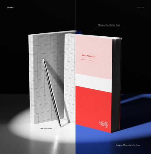 PSD mockup featuring two vertical planners with distinct covers and a silver pen, set in a high-contrast studio lighting scene.