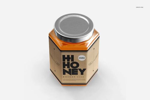 Front-facing honey jar mockup with a silver lid and beige label, filled with amber honey, isolated on white.