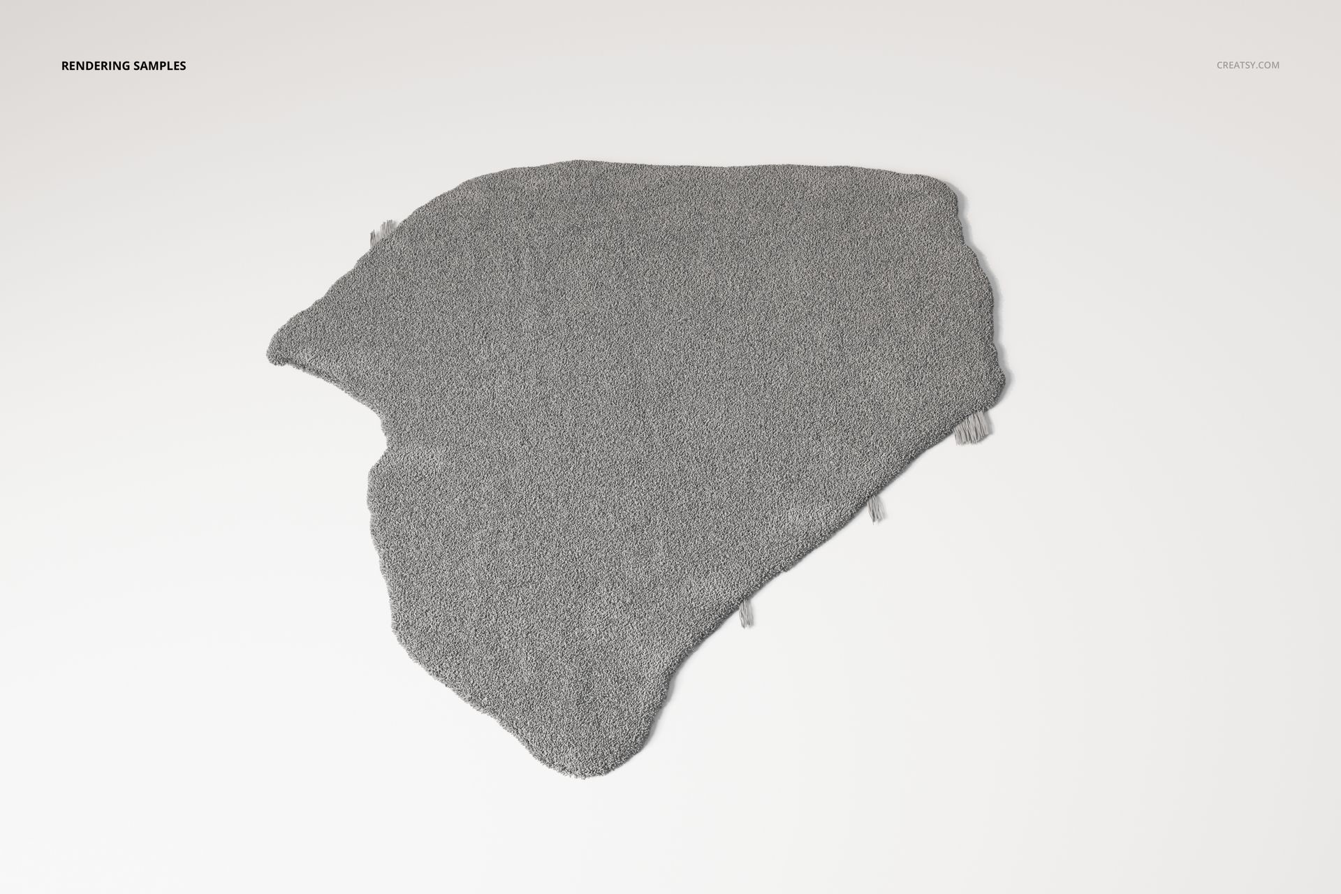 Irregularly shaped gray rug resembling a continent outline, shown from a top view on a white background.