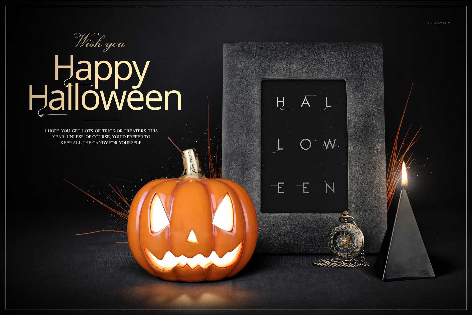 Halloween PSD mockup featuring glowing jack-o'-lantern, black picture frame, candle, and pocket watch on a black surface.