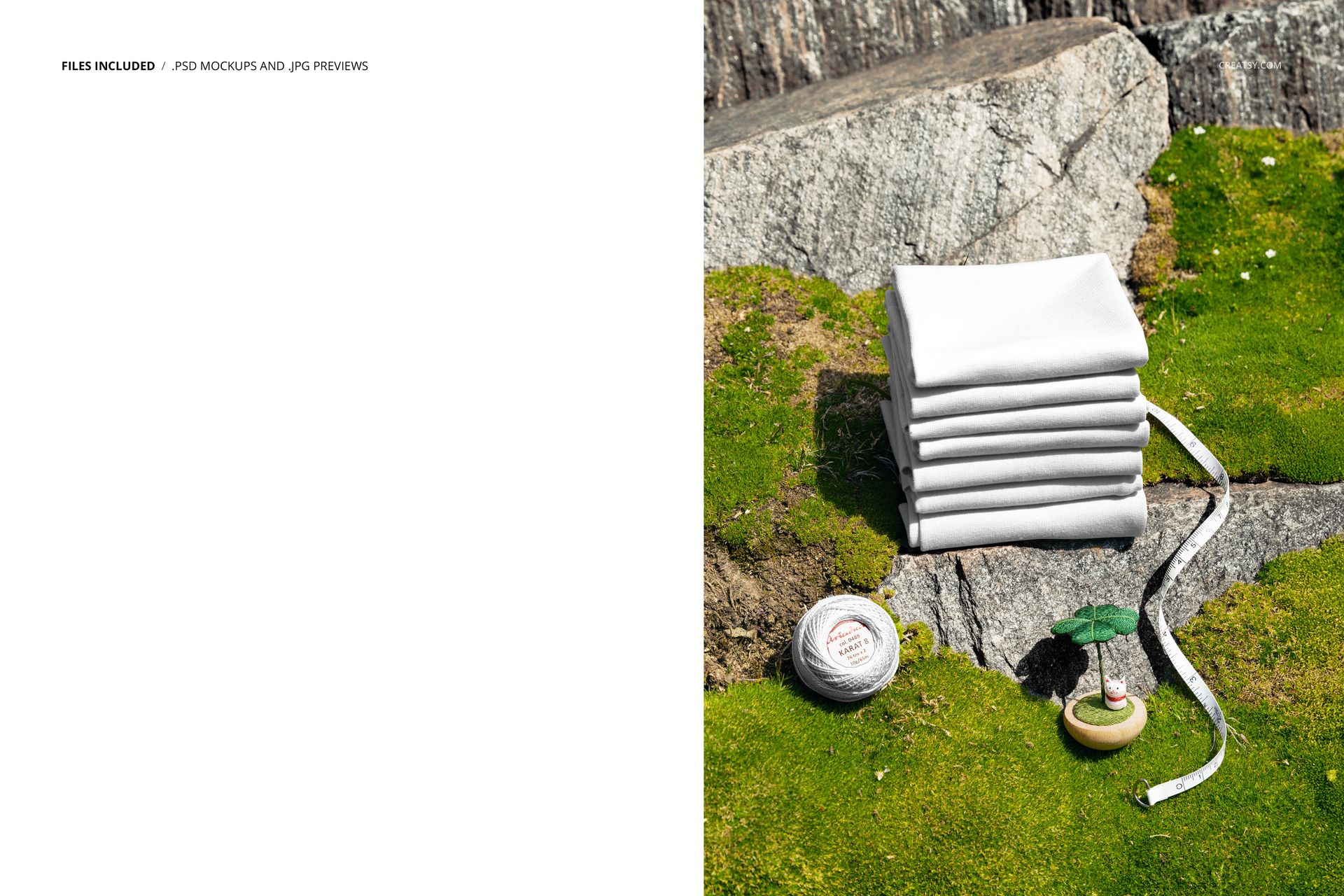 PSD mockup showing white fabric stack on moss-covered rock, with tape measure and small sewing props beside it.