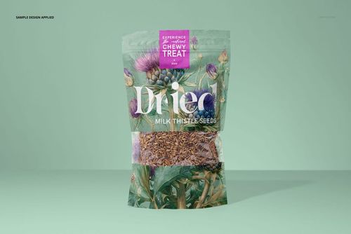 Front view of a paper pouch mockup for milk thistle seeds, featuring botanical illustrations and clear window with seeds.