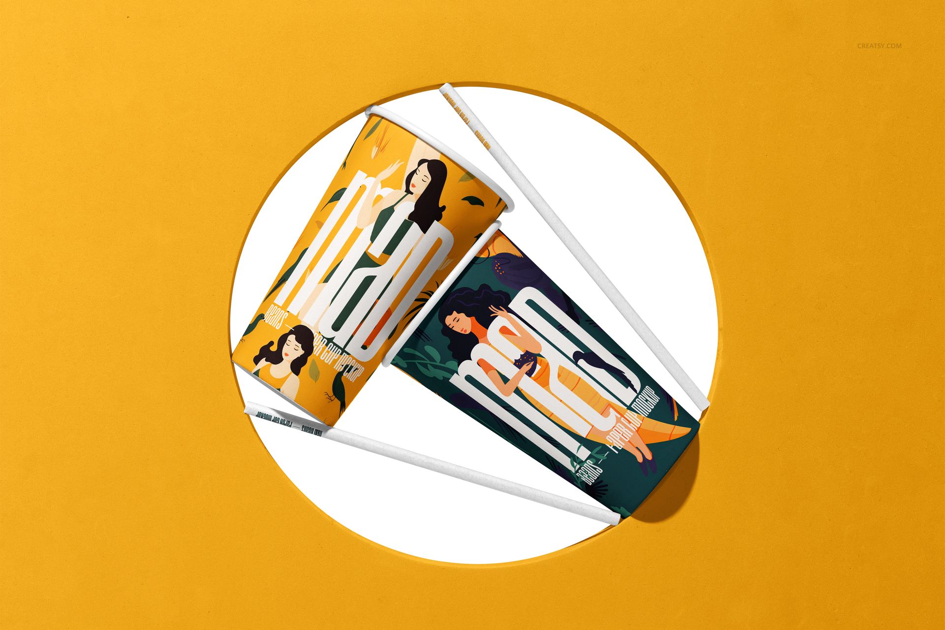 PSD mockup showing two decorated paper cups with straws, arranged on a bright yellow backdrop with a cutout.