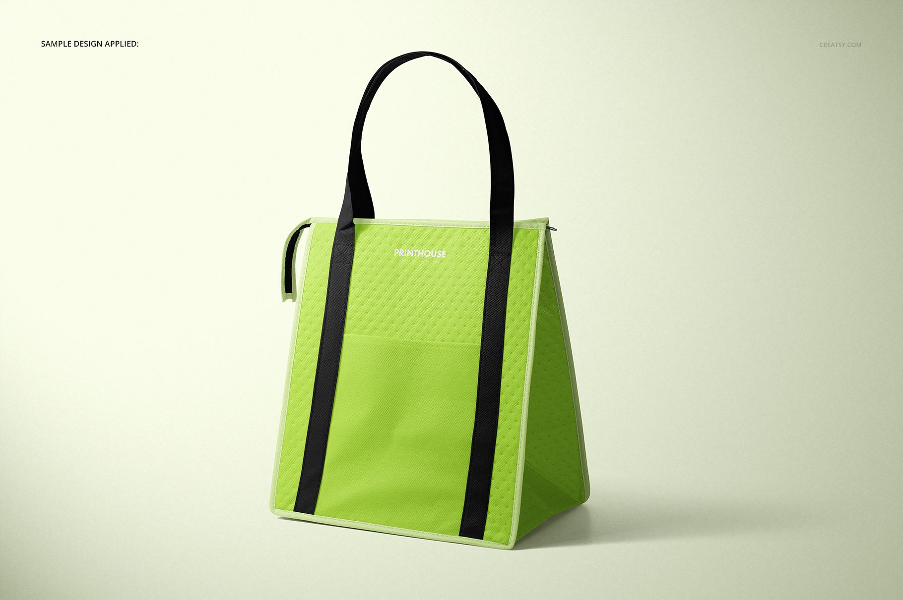 Insulated cooler bag mockup in bright green with black handles, shown in a three-quarter front view on a light background.
