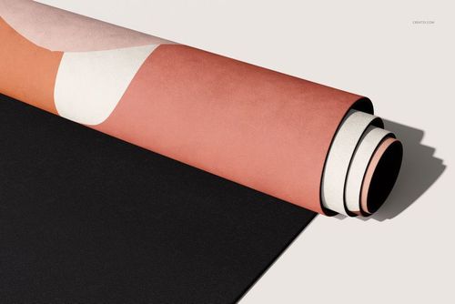 Yoga mat mockup featuring a rolled mat with soft peach and cream design, presented from a side angle on a plain background.