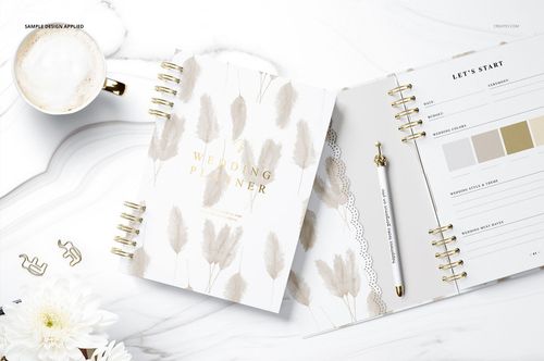 Spiral-bound planner mockup set displayed on a white marble surface, featuring neutral beige and gold accents.