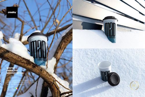 Winter paper cup mockup featuring a white cup with bold black text, black lid, and snowy outdoor setting with branches.