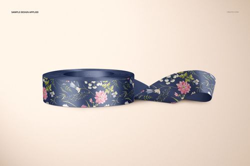 Ribbon mockup featuring a navy blue base with pink flowers and green leaves, displayed from a front angle.