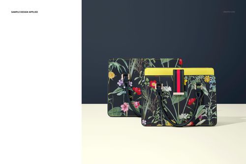 PSD mockup showing two leather handbags decorated with botanical prints, displayed side by side in a studio setting.