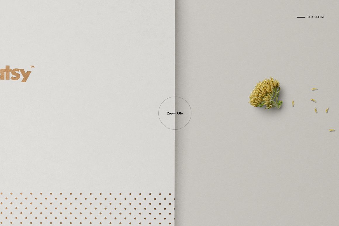 A5 notebook mockup with a white cover featuring gold dots, shown in a top view next to an open page with a yellow flower.