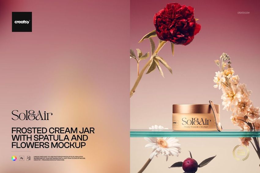 Cosmetic cream jar mockup with spatula, surrounded by vibrant flowers on a glass shelf against a pink background.