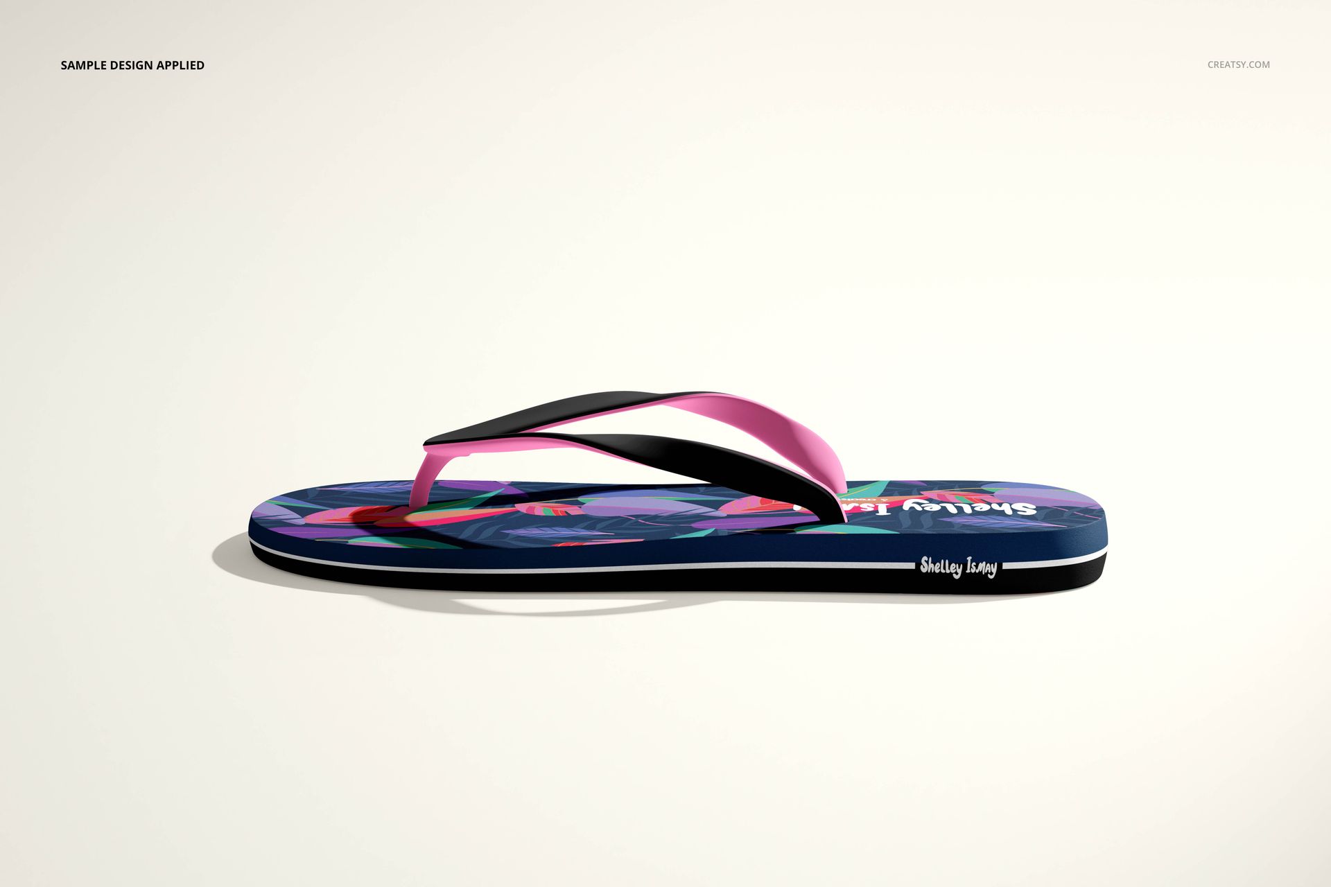Flip flop mockup displayed from the side, featuring multicolored straps and a vibrant patterned sole.