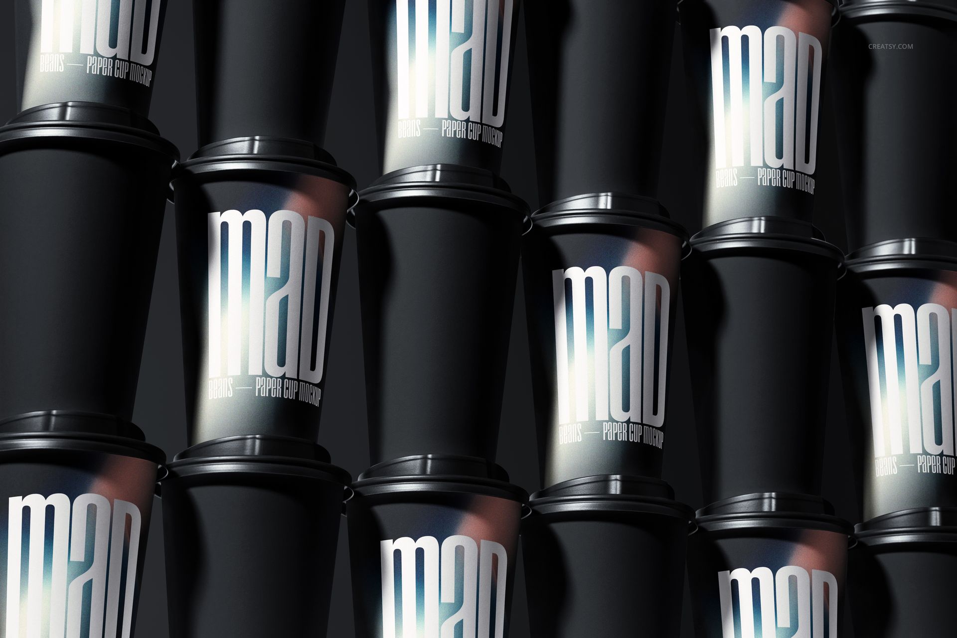PSD mockup showing several black paper cups with glossy surfaces and prominent white text, organized in vertical rows.