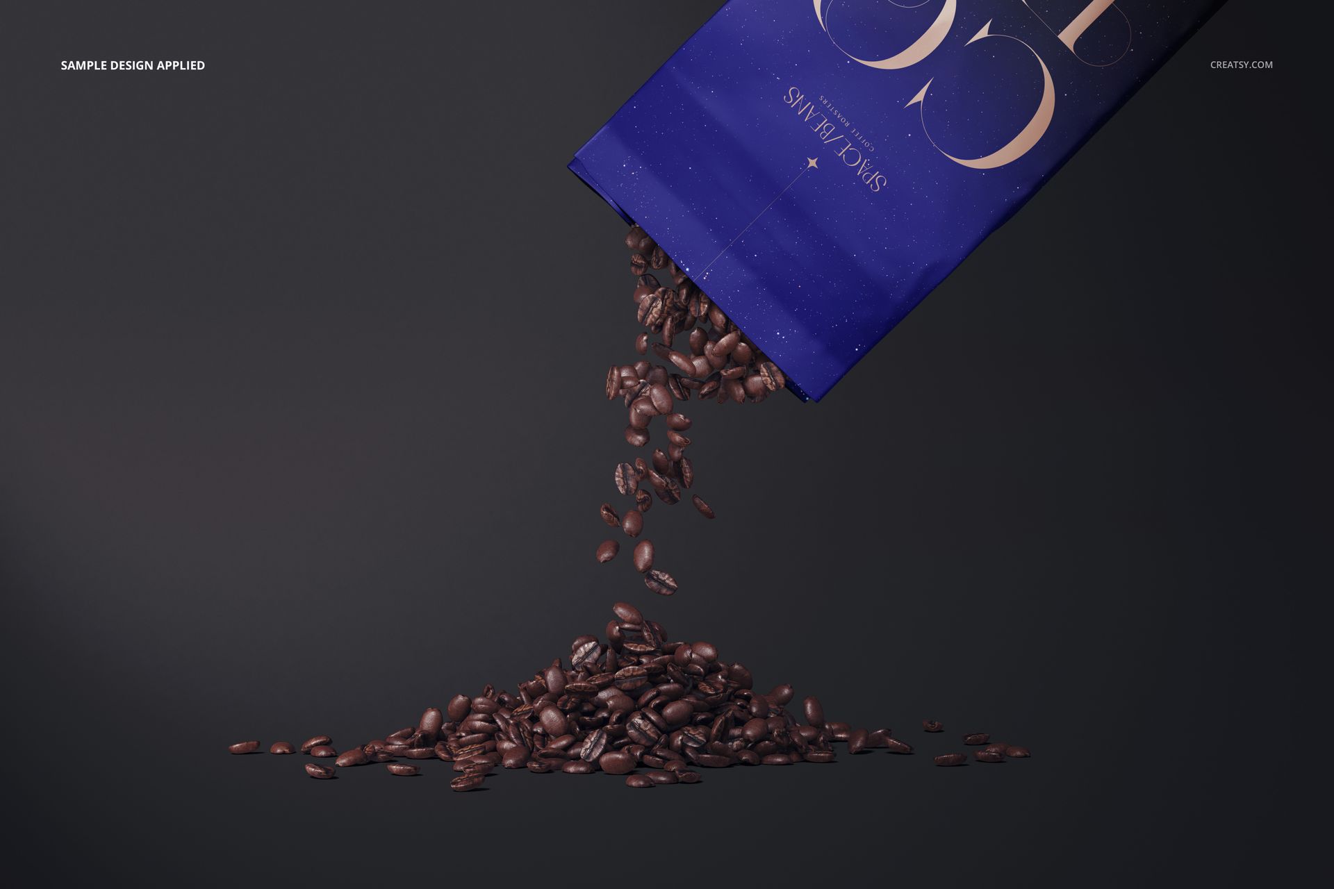 Matte coffee bag mockup in deep blue color shown spilling roasted coffee beans onto a dark surface, angled side view.