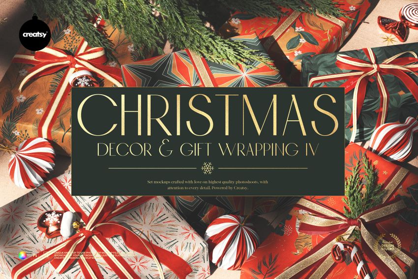 Wrapped gift boxes with ribbons and Christmas ornaments arranged on a surface, viewed from above with festive greenery.