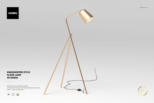 Modern floor lamp with a gold metallic finish, tripod legs, and angled shade, shown on a plain light background.