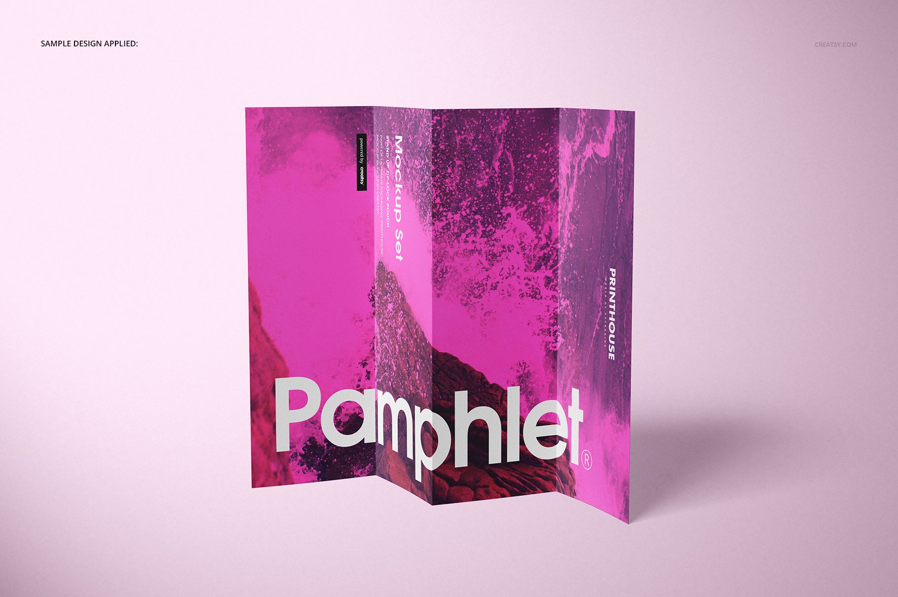 Tri-fold pamphlet mockup displayed standing upright on a light pink surface, featuring a vivid magenta design.