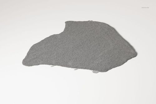 Gray rug shaped like a continent outline, displayed on a plain white surface from a top-down perspective.