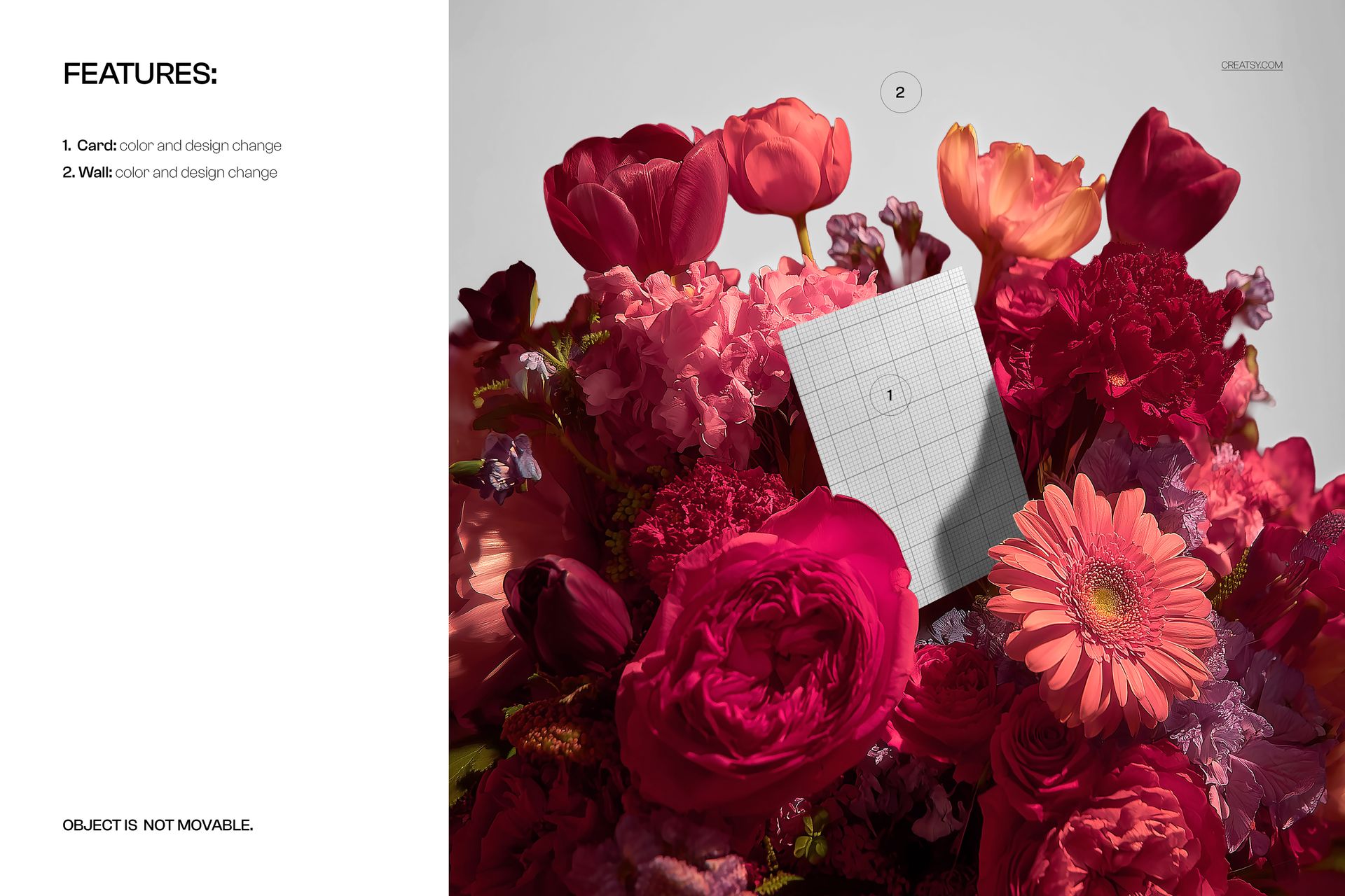 Greeting card mockup placed upright among a vibrant bouquet of red, pink, and orange flowers, viewed from the front.