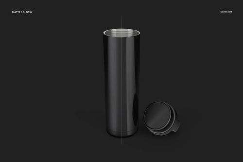 Black double wall vacuum tumbler mockup displayed upright with its lid placed next to it on a plain dark surface.