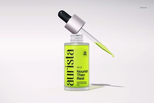 Dropper bottle mockup featuring a neon yellow cosmetic liquid, with pipette resting on the bottle, isolated on white.