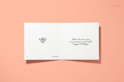 Square folded greeting card mockup displayed open on a peach background, showing minimal artwork and handwritten text.