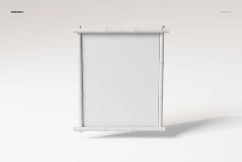 Front view of a rectangular bamboo frame accent mirror with a simple white background and soft shadows.