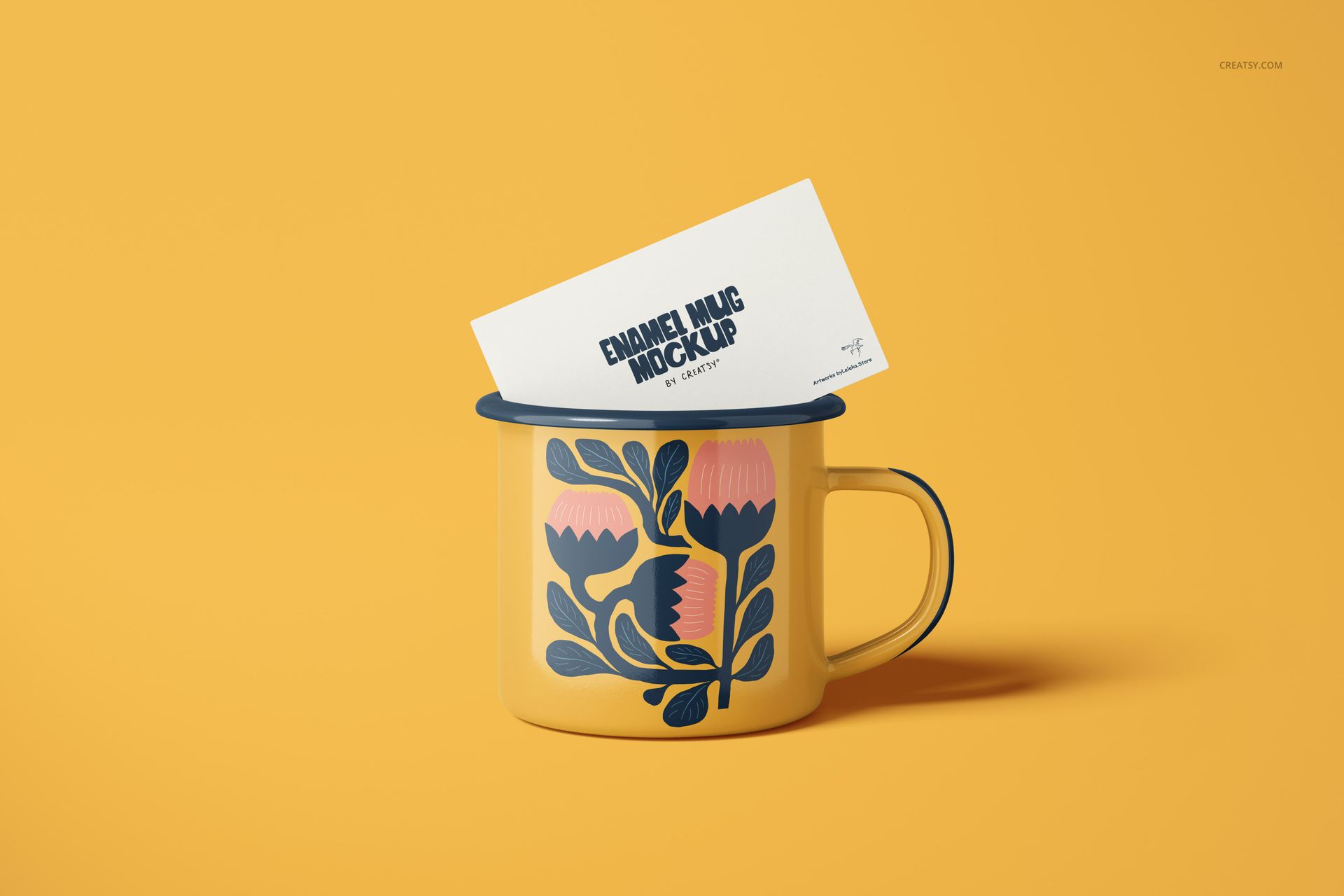 PSD mockup of a yellow enamel mug with a blue floral motif and a rectangular card standing inside the mug.