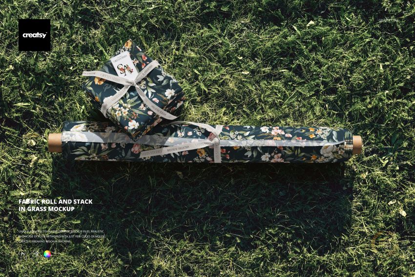 Fabric Roll and Stack in Grass Mockup - mockup screenshot 1