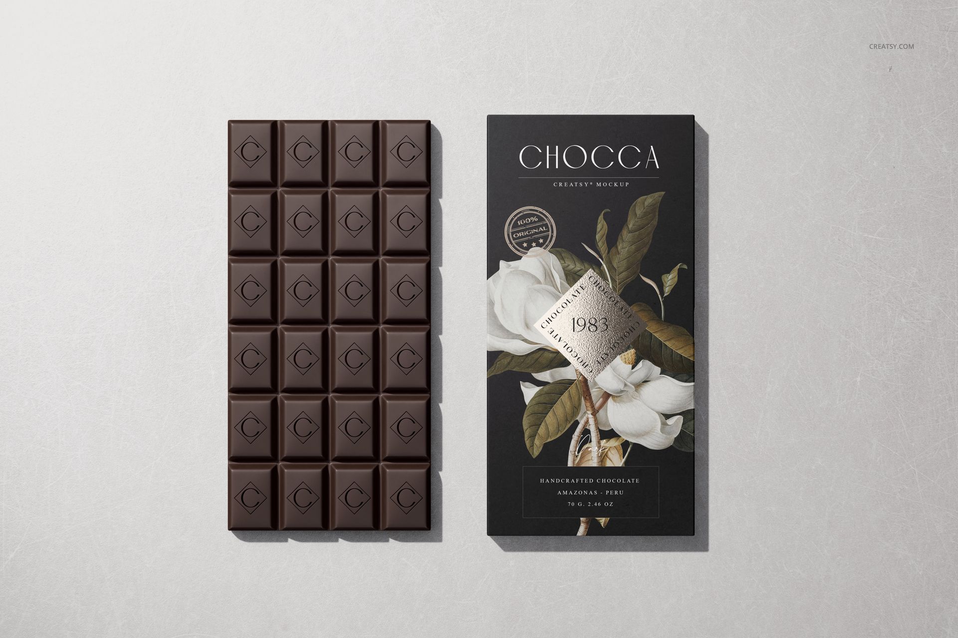 Chocolate bar mockup featuring a dark chocolate bar with square segments beside elegant botanical packaging design.
