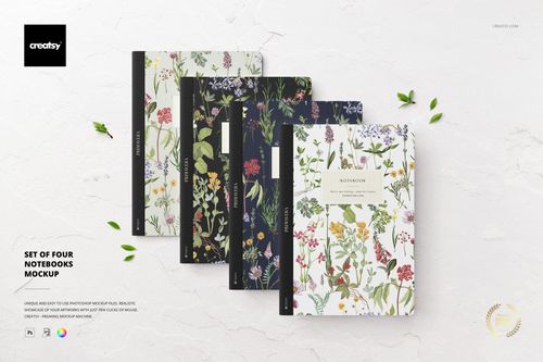 Botanical-themed notebook mockup set shown from a top perspective, with leaves scattered on a pale background.