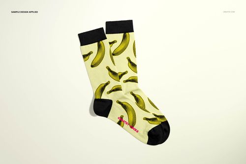 PSD mockup of medium cuff socks, shown from above, with playful banana graphics and contrasting black details.
