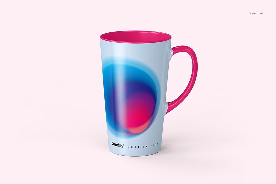 Front view of a 17 oz latte mug with a pink handle and interior, featuring a blue and magenta abstract design on a light background.