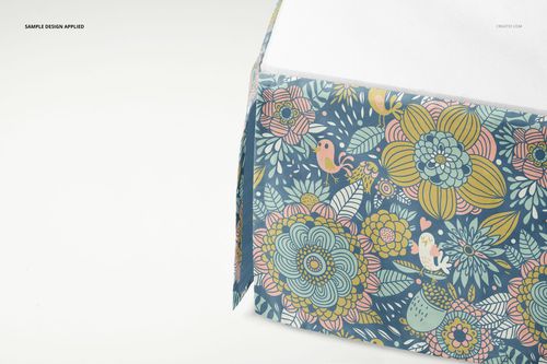 PSD mockup of a crib skirt featuring a detailed botanical and bird design, displayed in a bright setting.