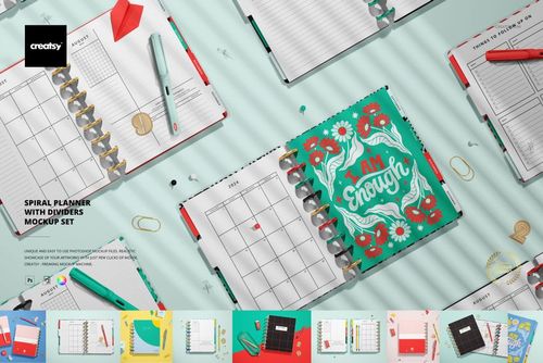 PSD mockup of spiral planners featuring various divider designs, shown with stationery props and shadows on a flat surface.