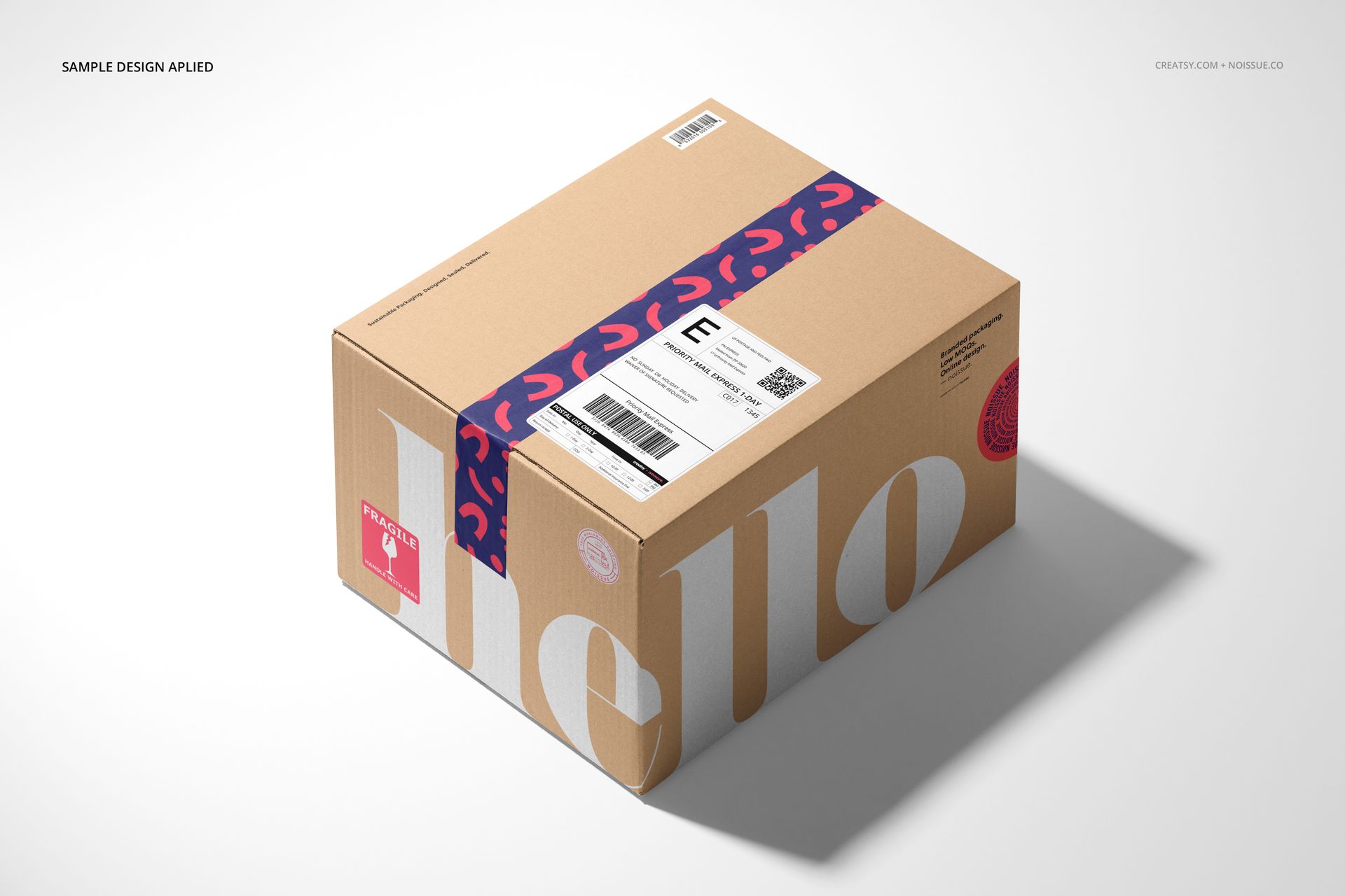 Mockup of a kraft mailer box with white text, navy and pink tape, and a shipping label, displayed on a light background.