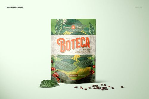 Doypack bag pouch mockup featuring a vibrant green and cream pattern, coffee beans scattered in front, on a plain surface.