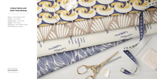 Cotton fabric mockup showing folded textiles with geometric and organic designs, styled with scissors, tape, and tailor props.