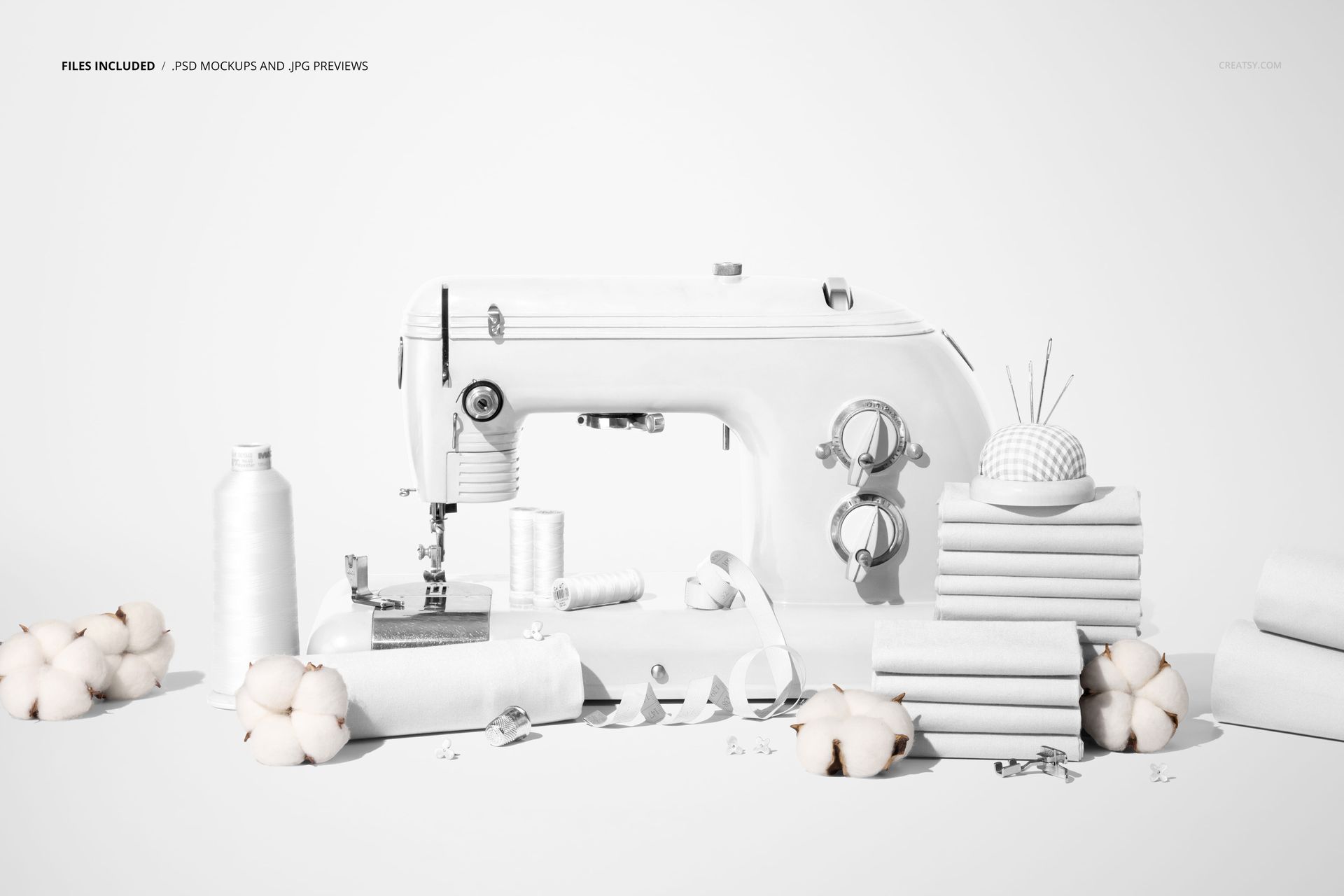 Cotton fabric mockup scene featuring a sewing machine, folded fabrics, thread spools, and cotton balls in a minimal setting.