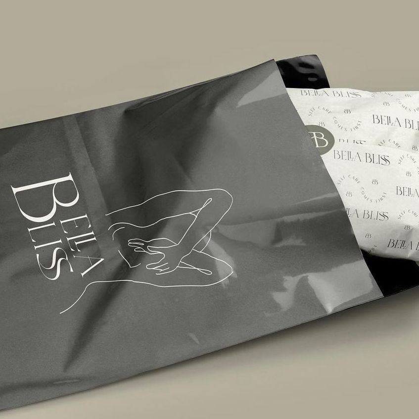 Mailer bag mockup with minimalist line art and bold text, partially open to reveal patterned tissue paper inside.