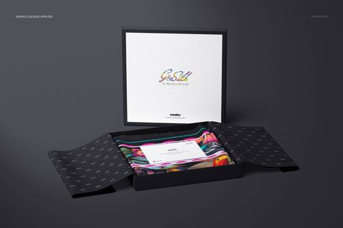 Lightweight cashmere scarf mockup set in a black box, showing multicolored fabric and an informational card.